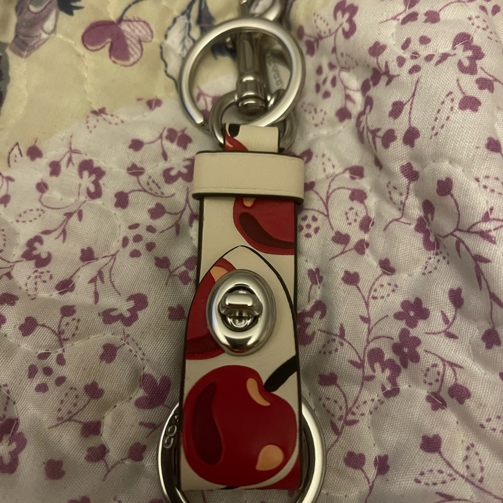Sold Coach Cherry Print Keychain with Silver Accents